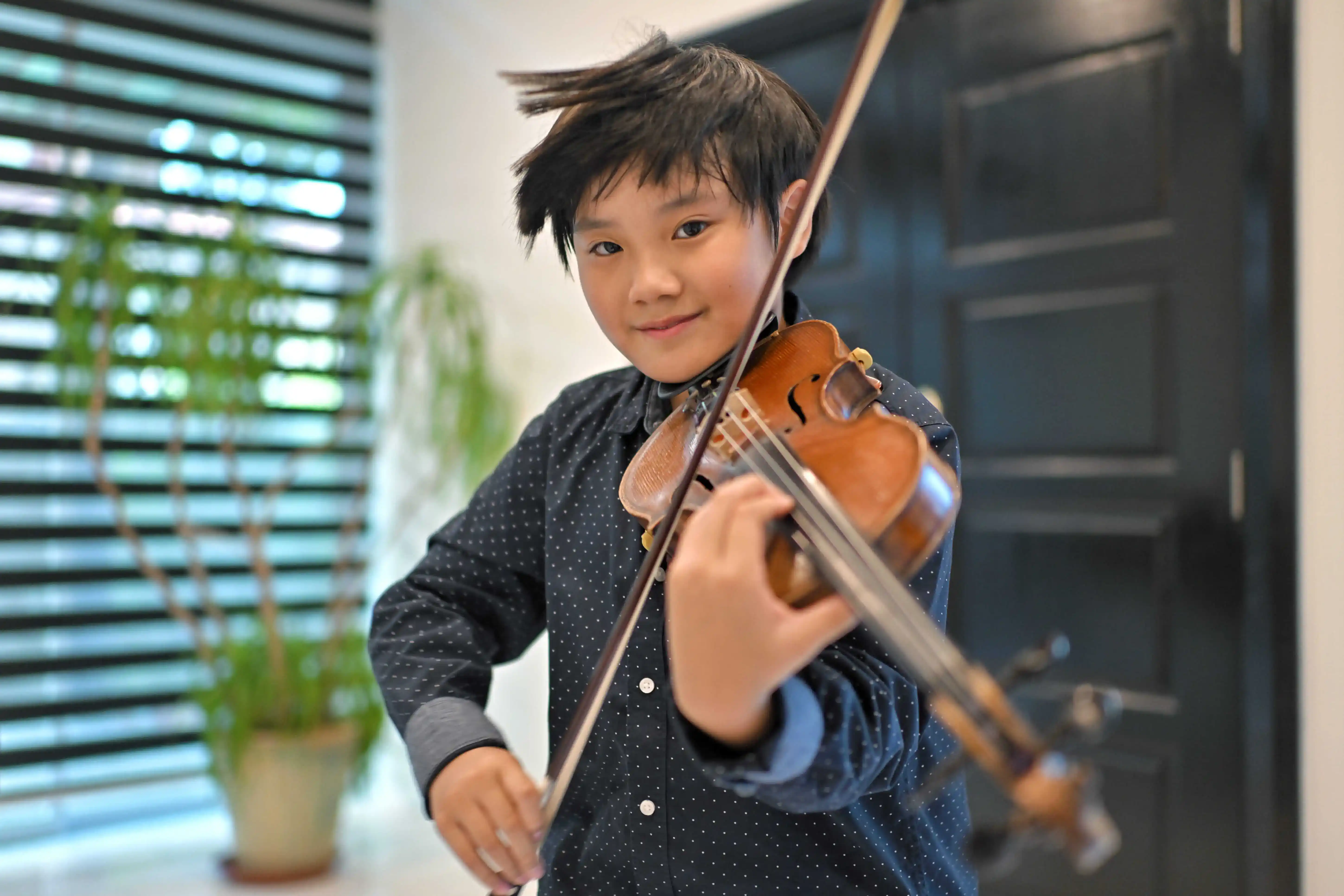 9-year-old Singaporean playing violin